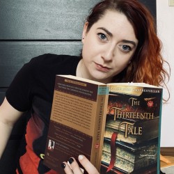 Museum Employee, Astin Green, is reading The Thirteenth Tale by Diane Setterfield